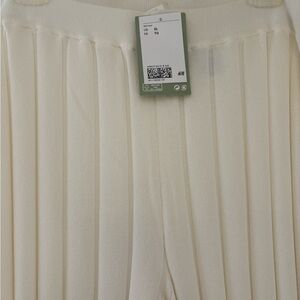 Women’s off white flare bottom ribbed pull on pants